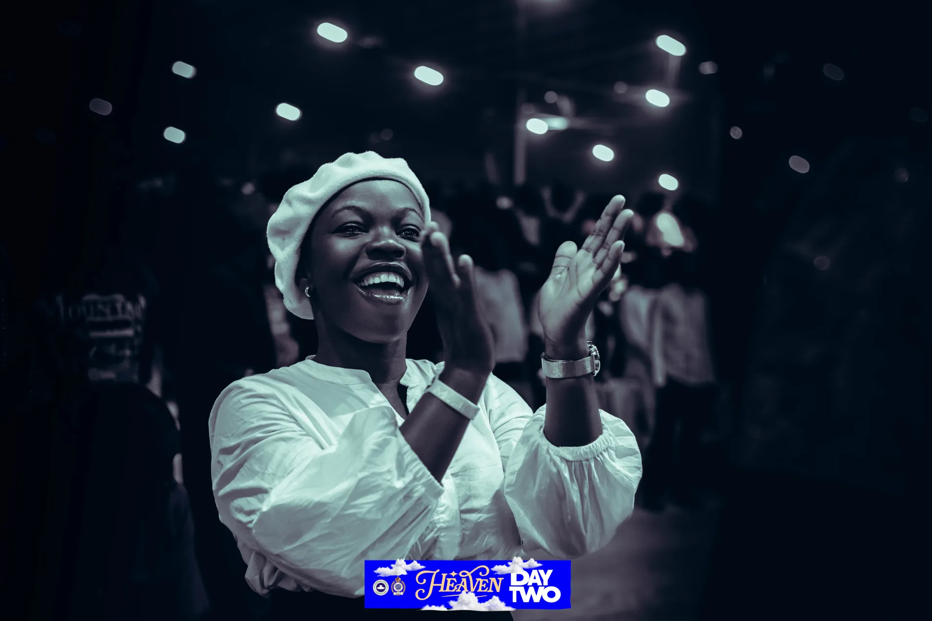 A joyful attendee during the Day Two music session