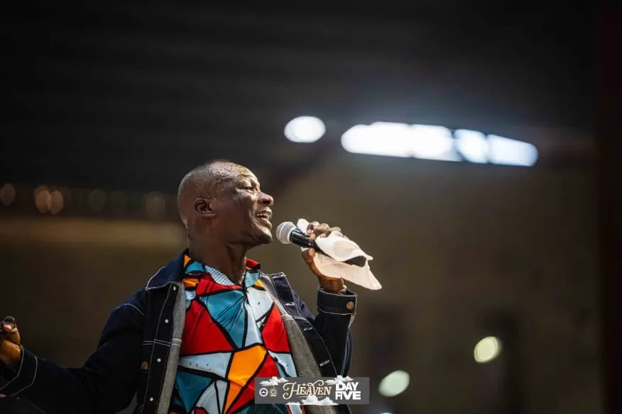 Minister Tee Worship leading worship